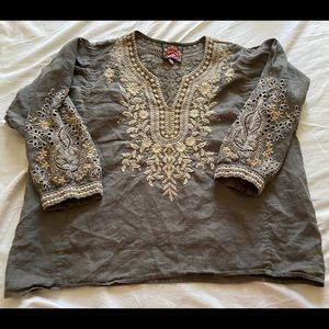 Airy linen top with stunning embroidery. Worn only twice. Perfect condition.